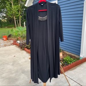 Black, long sleeve, mid length dress